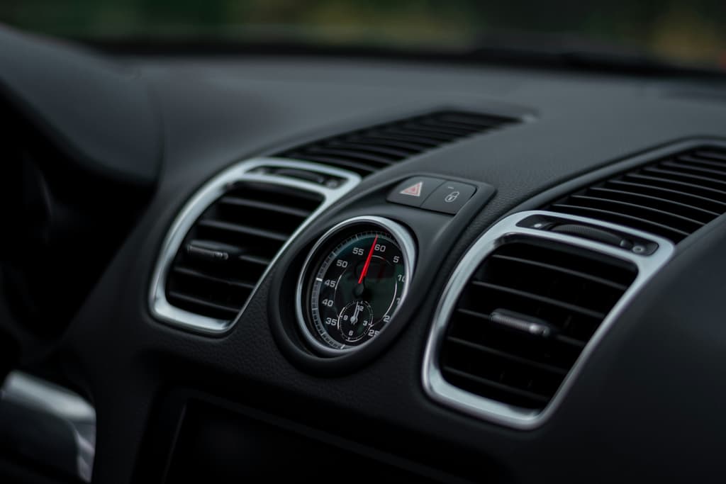 Clean car air conditioning vents highlighting the importance of regular air con cleaning for cars to improve airflow, cooling performance, and cabin air quality.