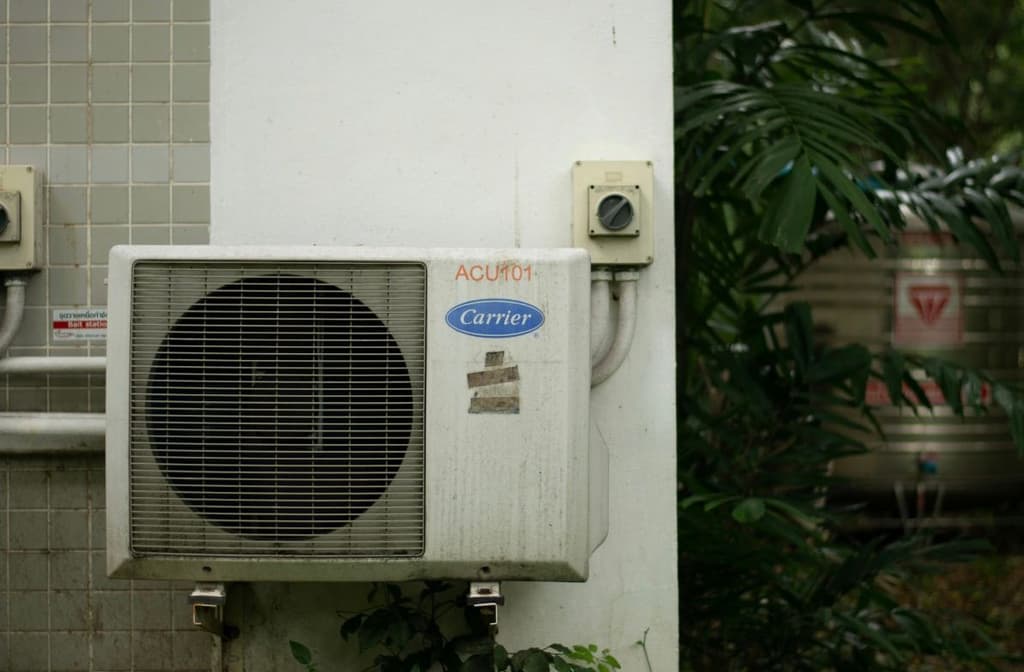 Outdoor air conditioning unit showing why regular air conditioner cleaner services help prevent airflow restrictions, system strain, and costly air conditioning repairs.